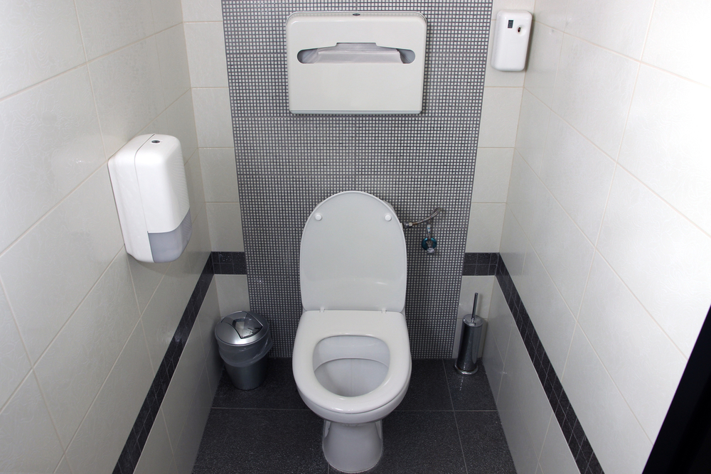 Public toilet seat via Shutterstock
